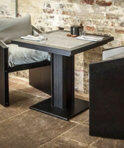 Ironfire grey bistro table with black frame in a cafe