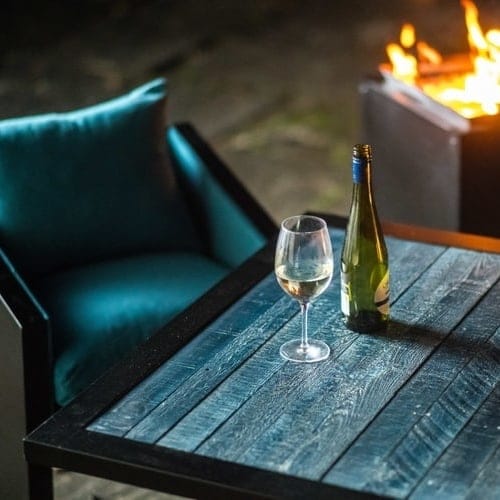 blue bistro chair and fire pit